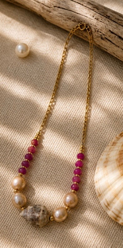 sapphire, Edison pearls, cone shell, and gold necklace